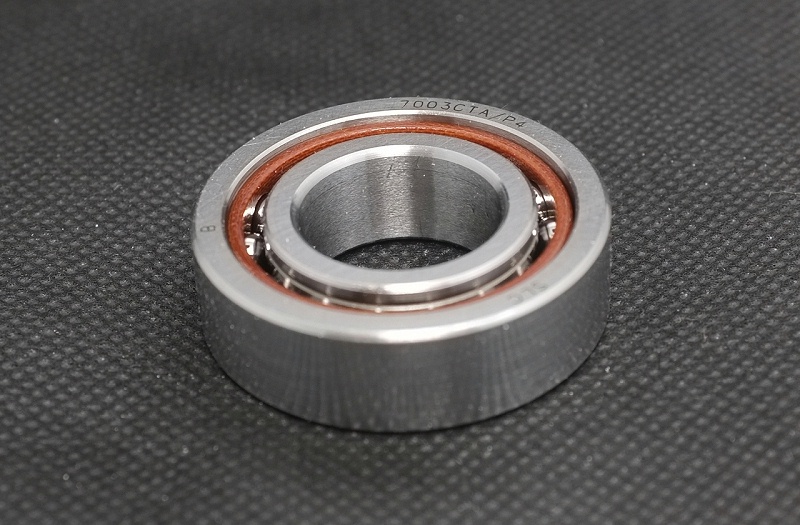 新換的主軸軸承發熱燙手正常嗎？